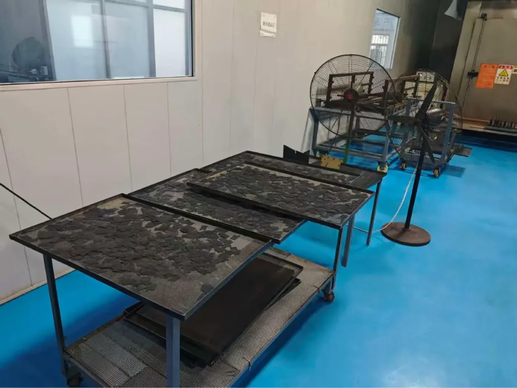Titanium anodes undergoing MMO coating drying process after coating application